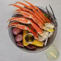 Snow Crab Boil · A fisherman's pound of Canadian snow crab legs, andouille sausage, corn on the cob & new pot...