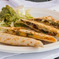 Club Quesadilla · Whole wheat flour tortilla, pico de gallo, bacon, chicken, sliced avocado, lettuce and cheese.