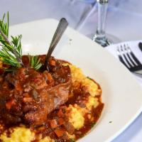 Ossobuco · Veal shank served over our saffron risotto