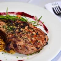 Veal Chop (12 Oz) · Veal chop on the grill served over a truffle mushroom risotto. Add mushroom brandy sauce at ...