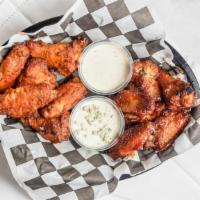 Traditional Wings (24) · Fire roasted wings - choose from buffalo, bourbon barbecue, honey garlic, garlic Parmesan, p...