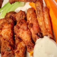 Mccabe'S Wings · Spicy. Mild, medium, hot, or Guinness BBQ with blue cheese, celery, and carrot sticks. (8 la...