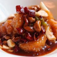Kung Po Prawns / 宮保蝦 · Hutong signature dish. Giant prawns tossed with sweet garlic and dry chili sauce.