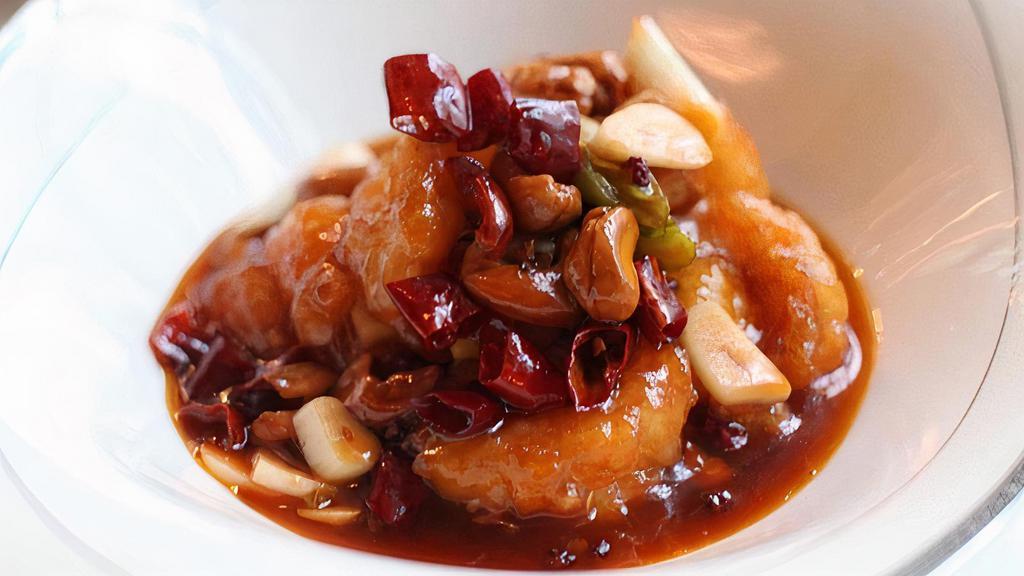 Kung Po Prawns / 宮保蝦 · Hutong signature dish. Giant prawns tossed with sweet garlic and dry chili sauce.