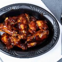 Chicken Wings · Ten pieces. Hot, BBQ or plain.