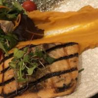 Salmon Mancora · Grilled fresh salmon filet, in a capers sauce with lime juice and shrimp, sweet potato puree...