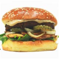 Black Bean Burger · Black bean patty, vegan cheese sauce, grilled onions, grilled mushroom, arugula, pickle, 100...
