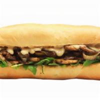 Creamy Shroom Sandwich · Grilled mushroom, grilled onion, vegan cheese sauce, arugula, 1000 island dressing. Served o...