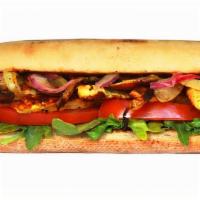 Grilled Chick'N Sandwich · Vegan grilled chick’n strips, grilled mushroom, grilled onions, tomato, arugula, 1000 island...