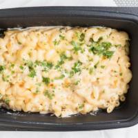 Mac & Cheese · Vegetarian. Three-cheese sauce, and buttered bread crumbs.