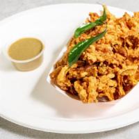 Onion Pakoda · Onion Pakoda is onion fritters made with thinly sliced onions, gram flour or besan batter, a...