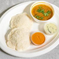 Idly (2) Pcs · Steamed rice and lentil cakes, served with sambar and chutney.