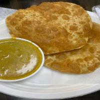 Poori Kurma · Deep-fried white / wheat flour bread Served with Kurma