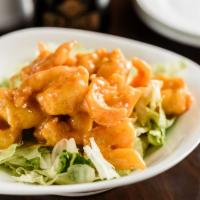 Spicy Rock Shrimp · Baby tempura shrimps coated with A scrumptious creamy and spicy sauce.
