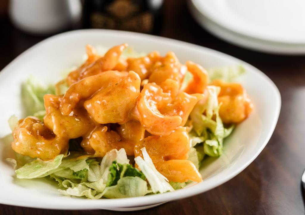 Spicy Rock Shrimp · Baby tempura shrimps coated with A scrumptious creamy and spicy sauce.