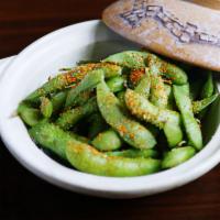Spiced Edamame · Steamed soy bean in pods seasoned with Sea salt and Japanese spices.