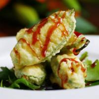Tempura Cheese Jalapeno · Cream cheese stuffed jalapeno wrapped in tempura batter, served with Eel sauce.