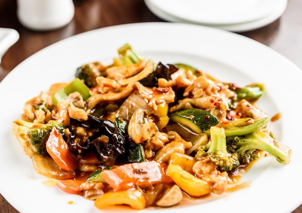 Chicken With Garlic Sauce · Chicken breast with mixed vegetables in a sweet, sour, spicy & garlicky brown sauce.