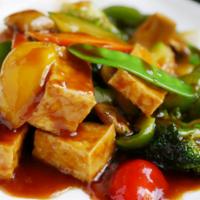 Tofu Garden · Fried tofu and mixed vegetables stir-fried in house brown sauce.
