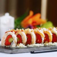 Super Crunchy Roll · Inside:spicy tuna and asparagus, outside: tuna, yellowtail, salmon, white tuna and tempura f...