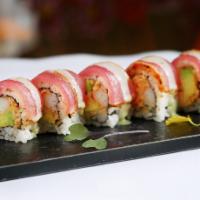 Bonsai Roll · Spicy crab and avocado inside, black pepper tuna and honey wasabi sauce on top.