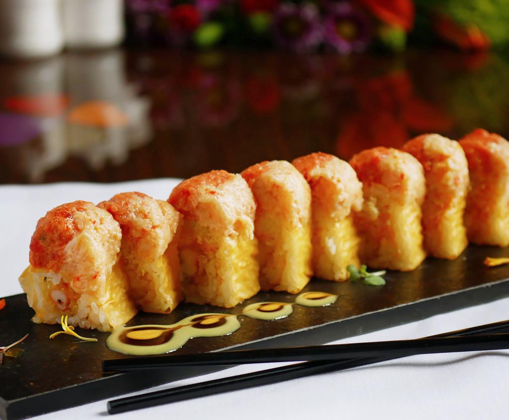 Sunrise Roll · Tempura shrimp, avocado, cucumber and spicy crab meat, topped with spicy tuna, crawfish salad, served with spicy mayo and honey wasabi eel sauce.
