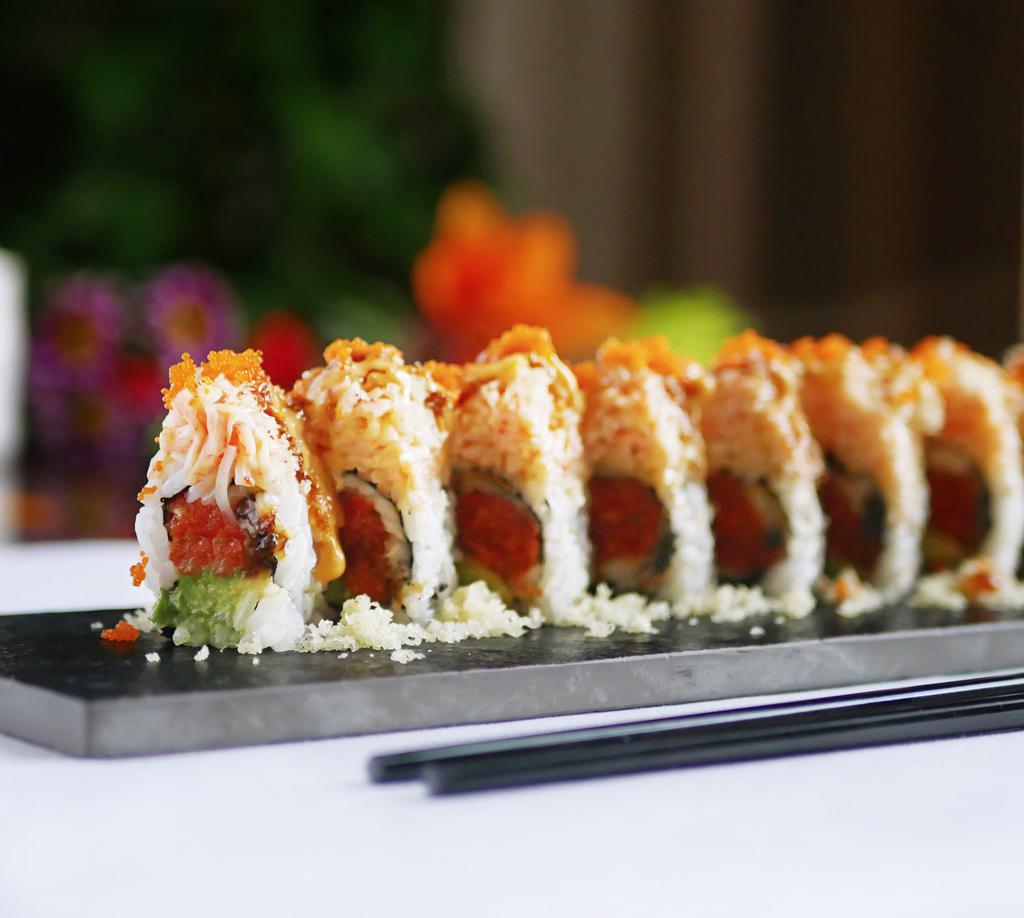 Fantastic Roll · Inside: eel, avocado and spicy crunchy tuna, outside: spicy crunchy crab and caviar, sauce: eel sauce and spicy mayo.