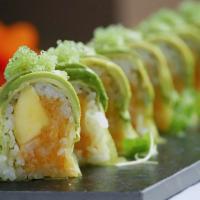 Wasabi Roll · Crunchy spicy scallop and mango rolled with nori seaweed, topped with avocado and wasabi tob...