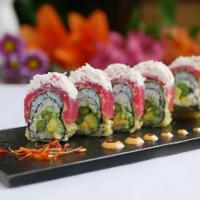 Eskimo Roll (6 Pc) · Cucumber, avocado and asparagus wrapped in nori seaweed, deep-fried, then topped with tuna, ...