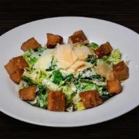 Caesar Salad  (Tp) · Fresh romaine lettuce, croutons and shaved parmesan tossed in a house made Caesar dressing