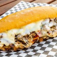 Cheesesteak Sandwich · Prime steak chopped, onions, peppers white American cheese, on a hoagie roll.