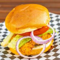 Spicy Crispy Chicken Sandwich · Deep fried chicken breast buffalo/ranch sauce pickles on a brioche roll.