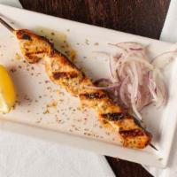 Chicken Souvlaki · Served with pita bread and tzatziki sauce and lemon.