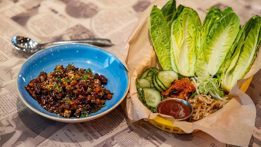 Bulgogi Beef Lettuce Wrap · Korean BBQ steak, five-spice tofu, shiitake. mushrooms, and veggies. Served with. housemade kimchi, bean sprout banchan,. and gochujang.