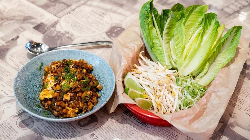 Pad Thai Lettuce Wrap · Chicken, fried tofu, egg, shiitake. mushrooms, and veggies, wok-fired in. Pad Thai sauce. Served with bean sprouts,. spring onions, and toasted peanuts.