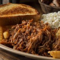 Pulled Pork Platter. · Seasoned and hickory-smoked pork, tossed with BBQ sauce and piled high. Served with our famo...
