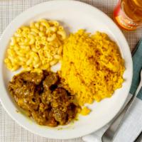 Medium Curry Goat · Choose rice and beans or yellow or white rice. Choose two vegetables from side choices.