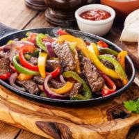 Sizzling Fajita Platters · Served in a sizzling platter with sauteed fresh onions and peppers in fajita sauce.