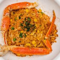 Seafood Fried Rice · Made w/Shrimp, Crab claw meat, corn, carrots, peas & eggs