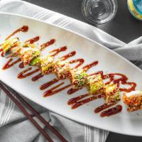 Hoki Dragon · Spicy tuna, tempura flakes, topped with eel, avocado,eel sauce.