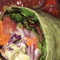 Chicken Pesto Wrap · All-natural chicken with pesto sauce, celery, onions, carrots, red cabbage, served with orga...