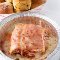 Homemade Lasagna · Beef, ricotta, mozzarella, sauce and romano cheese.