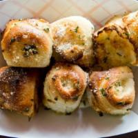 Garlic Rolls · Additional charge for sauce on the side.
