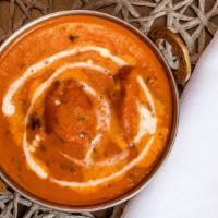 Butter Chicken · Breast of chicken skewed in tandoor (clay oven) and sautéed in special buttery sauce with sp...