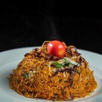 Chicken Biryani · Tender pieces of chicken cooked with our homemade spice and then layered with aromatic basma...