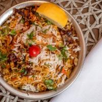 Vegetable Biryani · Mixed vegetables cooked with our homemade spice and then layered with basmati rice.