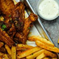 Wings · One Pound. Your Choice of Mild, Hot, Lemon Pepper, Honey BBQ, Old Bay. Served with Crispy Fr...