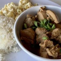 Estafao Adobo · Chicken or pork cooked in soy sauce, vinegar and seasoned with spices.