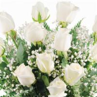 Dozen White Roses · A classic dozen of our finest white roses are truly the height of indulgence! Spoil someone ...