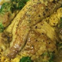 Coconut Curry Tilapia · Served with brown rice and broccoli.